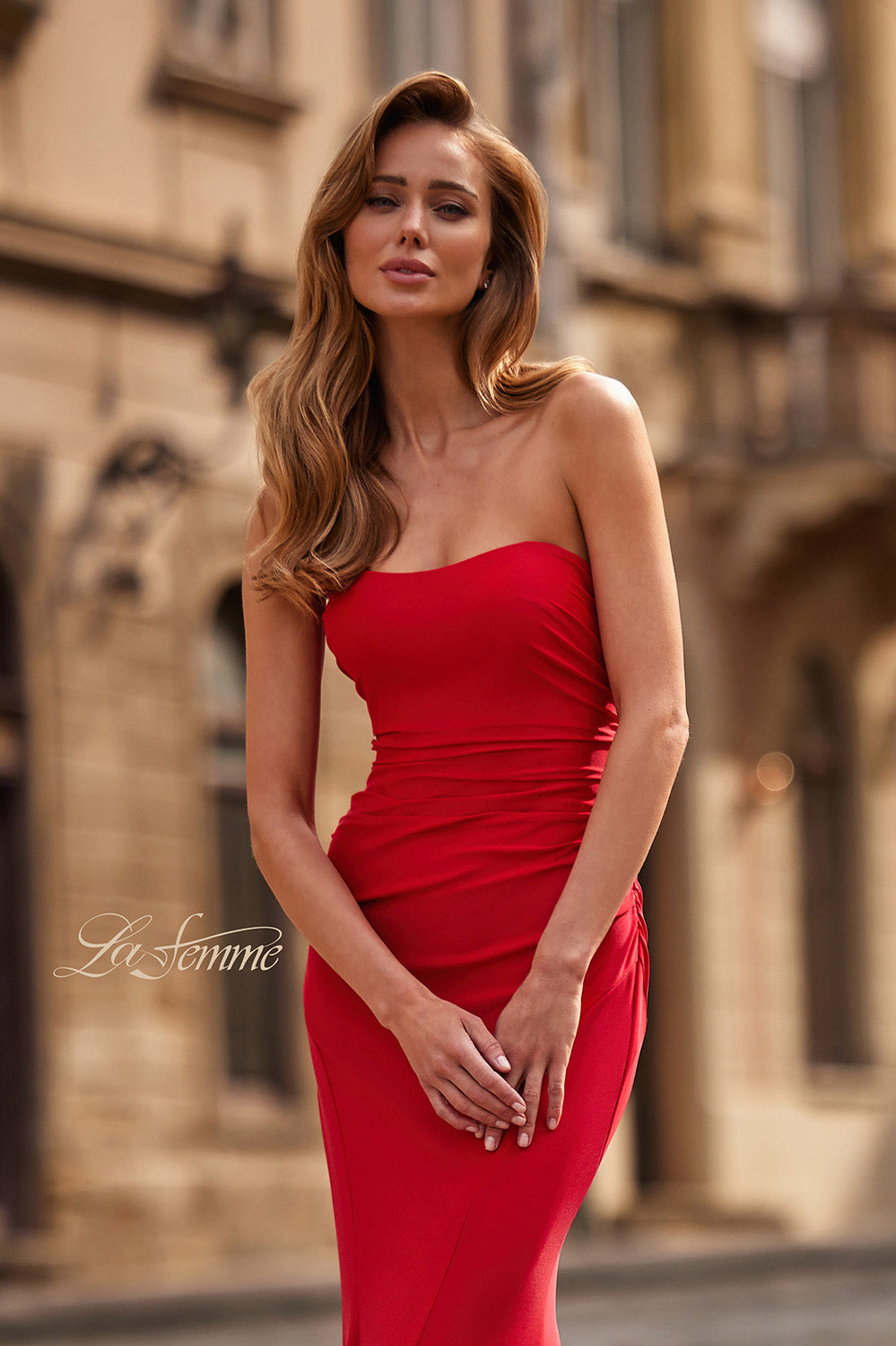 La Femme 33403 Red fitted prom dress with a sleek silhouette and elegant side slit.