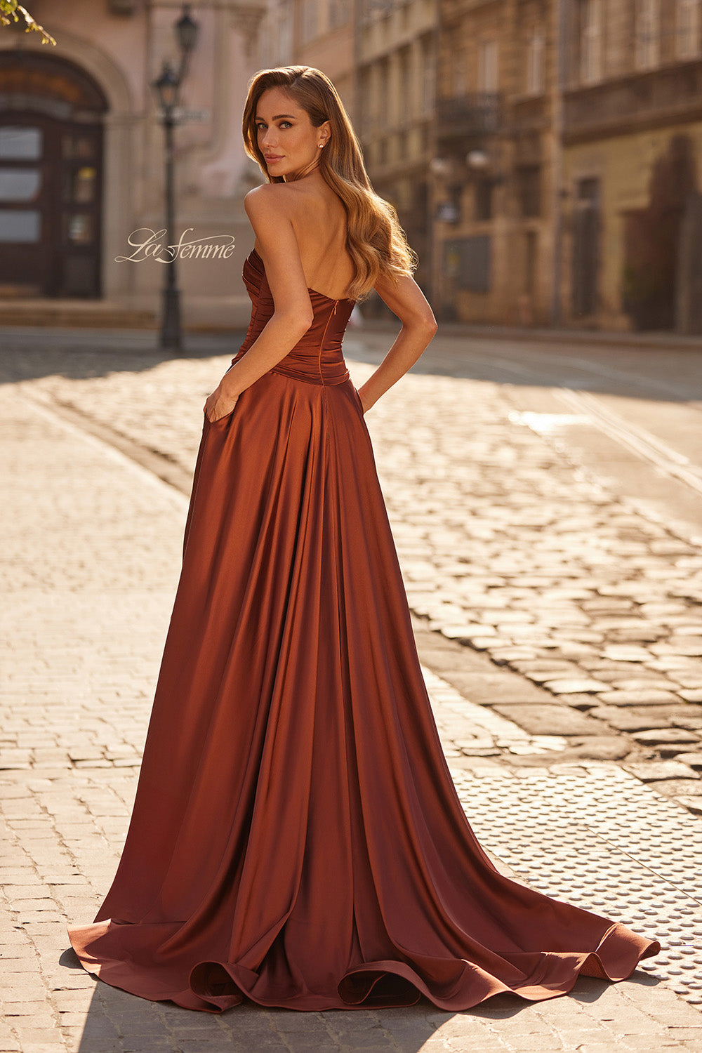La Femme 33417 Copper satin prom dress with a fitted bodice and flowing A-line skirt.