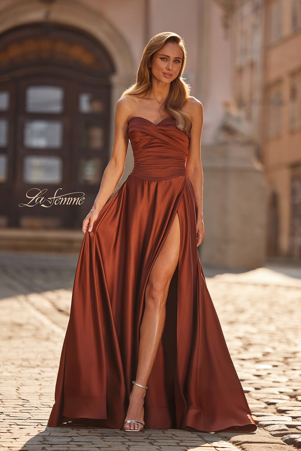La Femme 33417 Copper satin prom dress with a mermaid silhouette and high slit, front view.