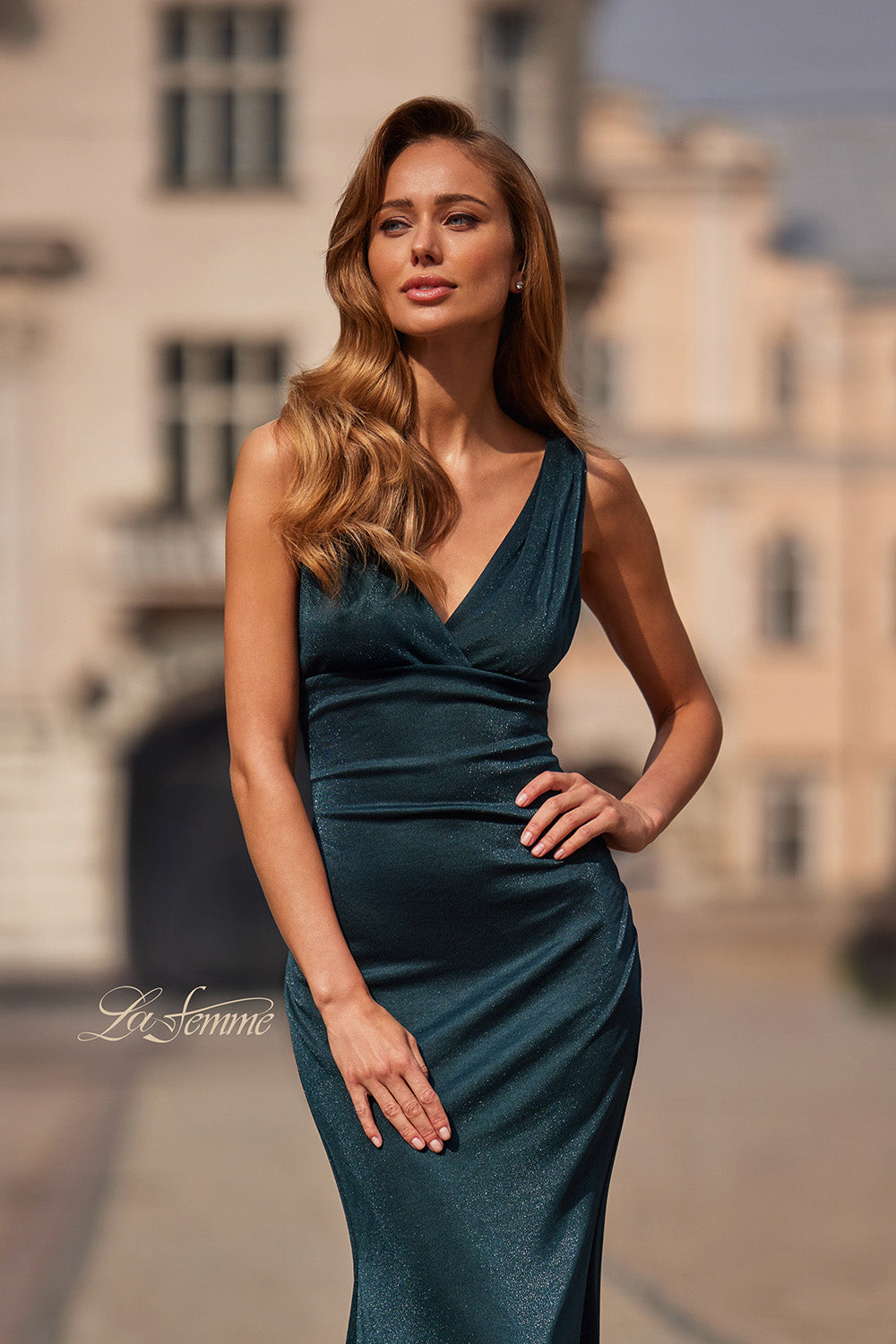 La Femme 33425 Dark teal fitted prom dress in metallic jersey with a deep V-neckline.