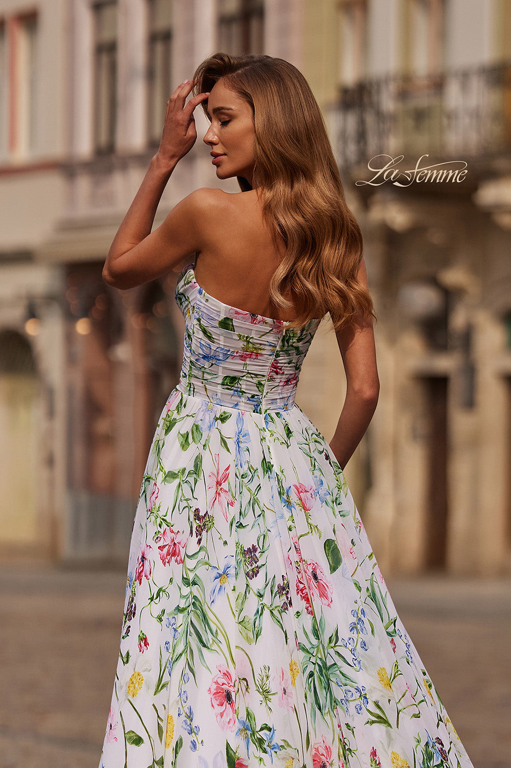 La Femme 33450 Multi-colored prom dress in floral print with a fitted bodice and flowing skirt.