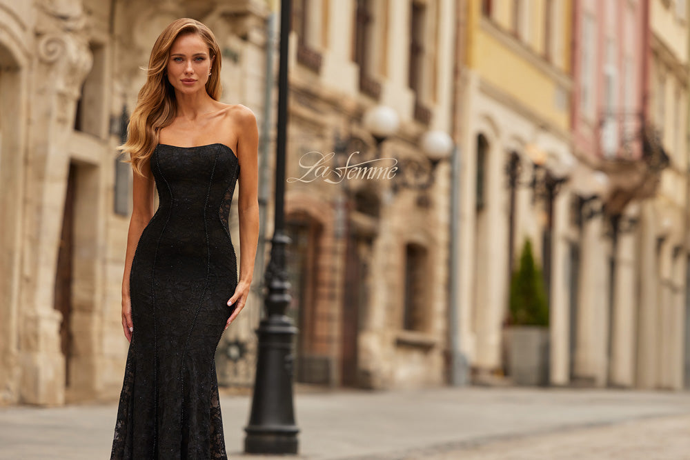 La Femme 33608 Black lace mermaid prom dress with a fitted silhouette and elegant strapless design.