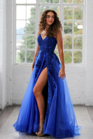 Miah Vega 24102 prom dress images. Miah Vega 24102 is available in these colors: Black, Light Pink, Lilac, Royal.
