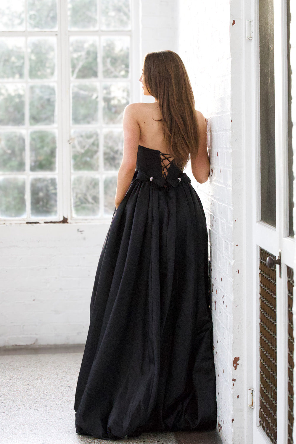 Miah Vega 24601 Black ballgown with a lace-up back, perfect for prom or formal events prom dress.