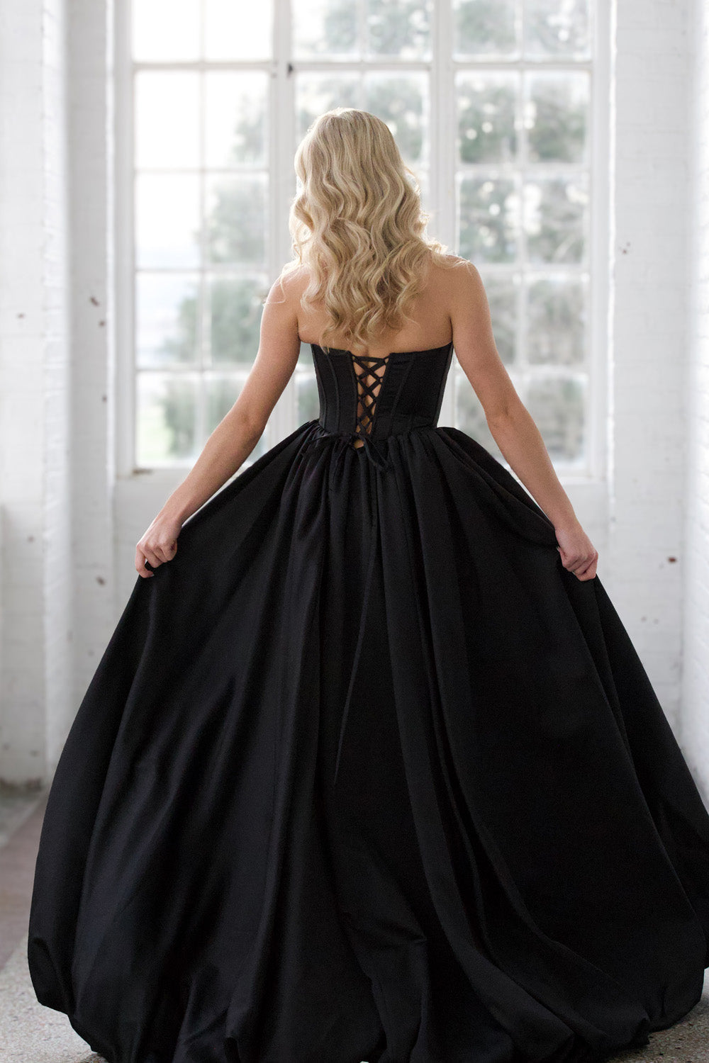 Miah Vega 24601 Black ballgown with a lace-up back, perfect for prom or formal events prom dress.