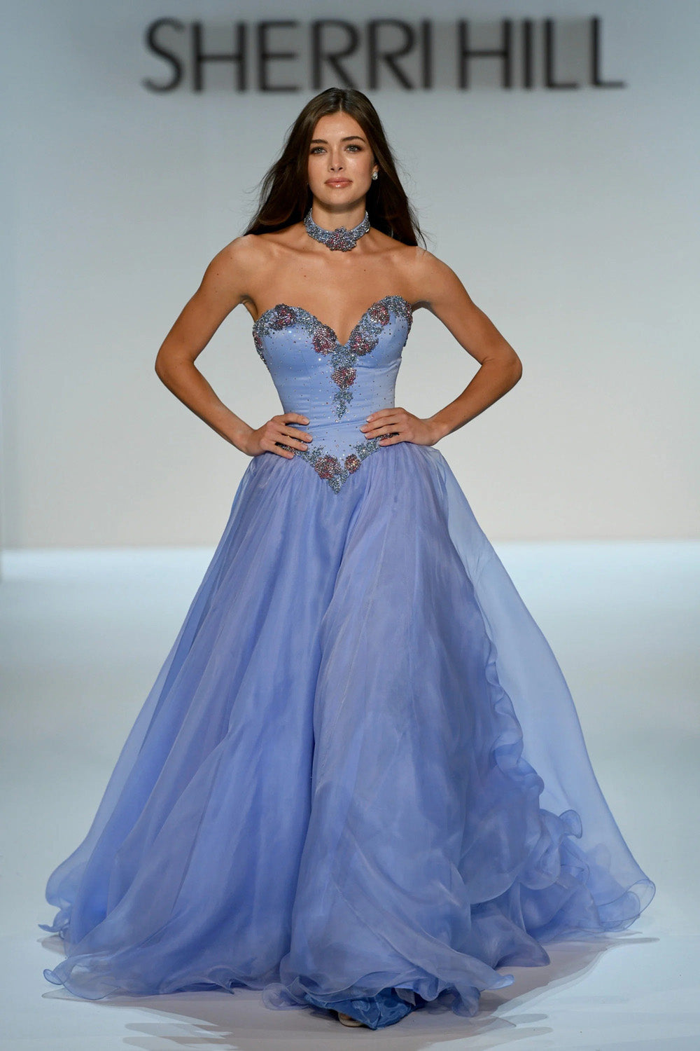 Sherri Hill 46406 periwinkle organza ballgown skirt caught mid movement showing layered ruffled hem