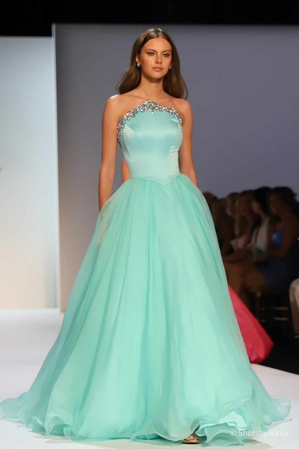 Sherri Hill 46702 seafoam ball gown full silhouette with sweeping layered chiffon train on runway
