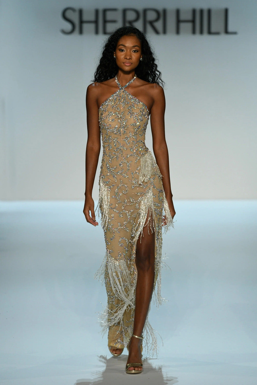 Sherri Hill 46727 nude silver beaded halter gown with scrolling embellishment and cascading fringe skirt full length view