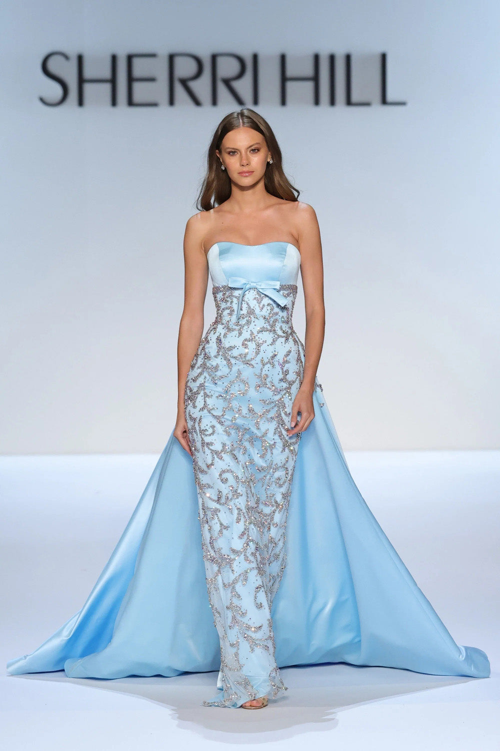 Sherri Hill 46743 light blue strapless gown with beaded column skirt and full satin overskirt front view