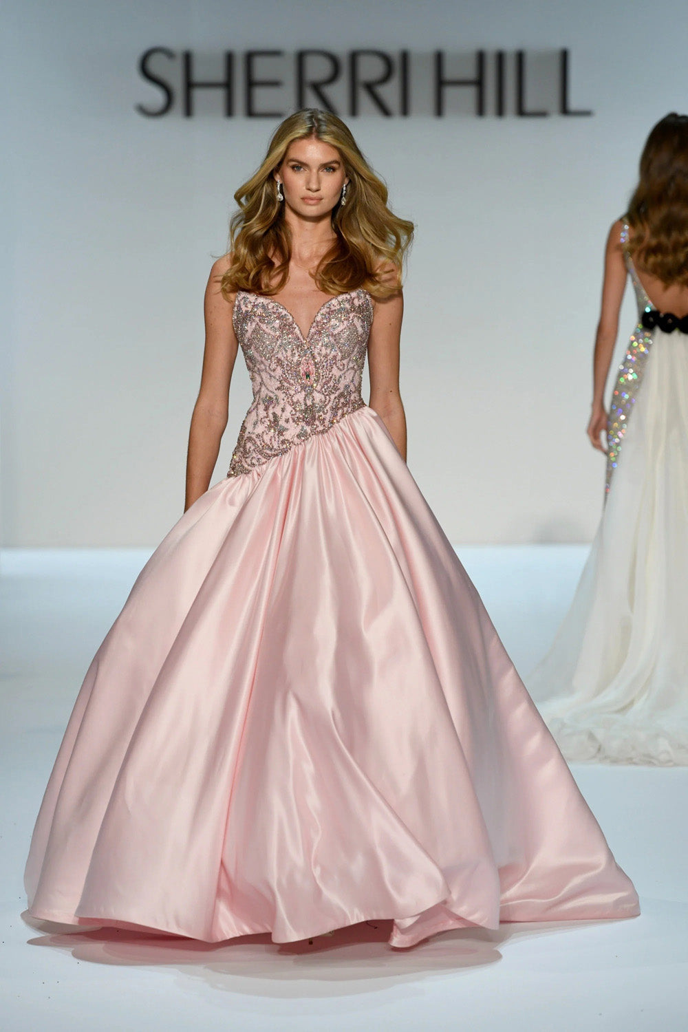 Sherri Hill 46748 blush satin ballgown with beaded sweetheart bodice and full gathered skirt on the runway