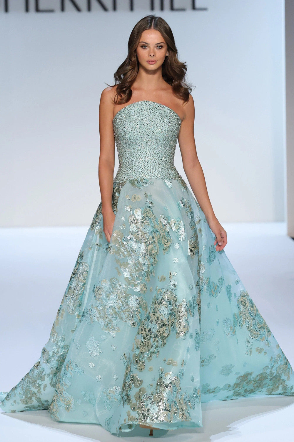 Sherri Hill 46749 aquamarine strapless ball gown with fully beaded bodice and metallic floral organza skirt