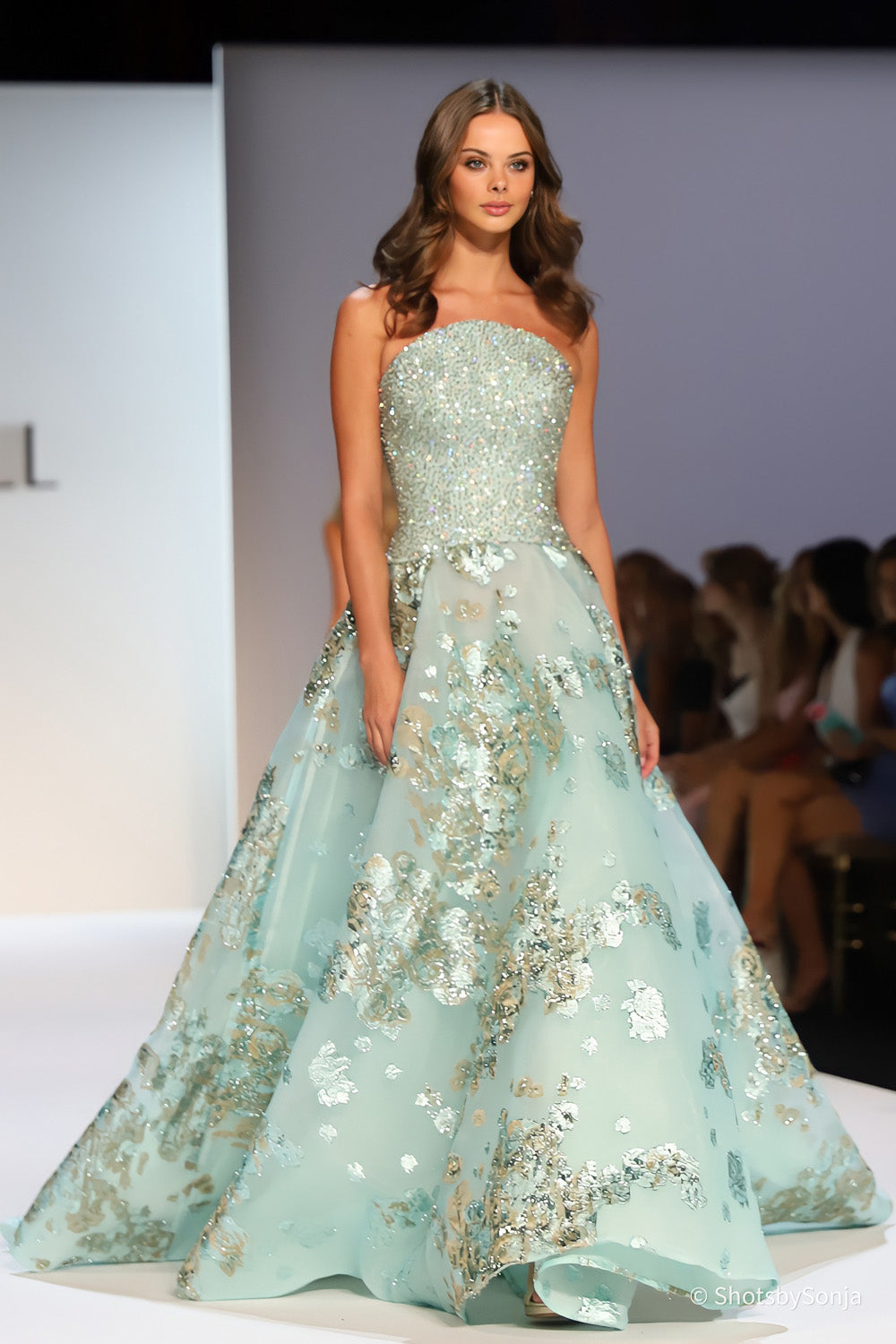 Sherri Hill 46749 aquamarine ball gown showing beaded waistline detail and voluminous silver floral skirt