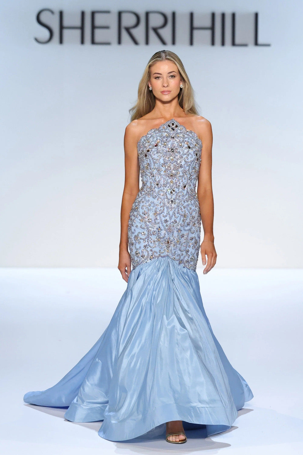 Sherri Hill 46752 sky mermaid gown full length view with beaded bodice and gathered taffeta skirt on runway