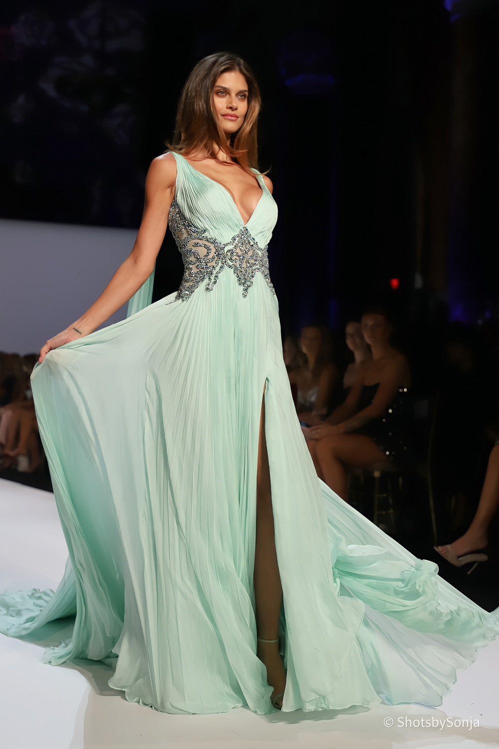 Sherri Hill 46755 mint pleated chiffon gown with embellished midriff and high front slit viewed from front