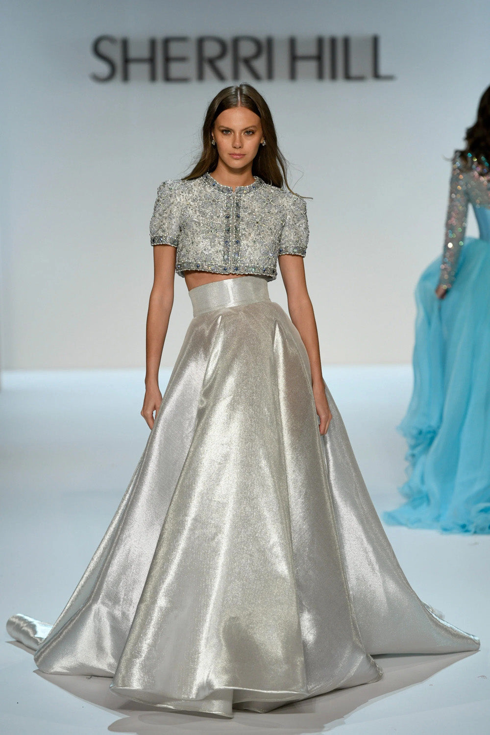 Sherri Hill 46780 silver two piece ball gown with beaded crop top and full metallic skirt front view