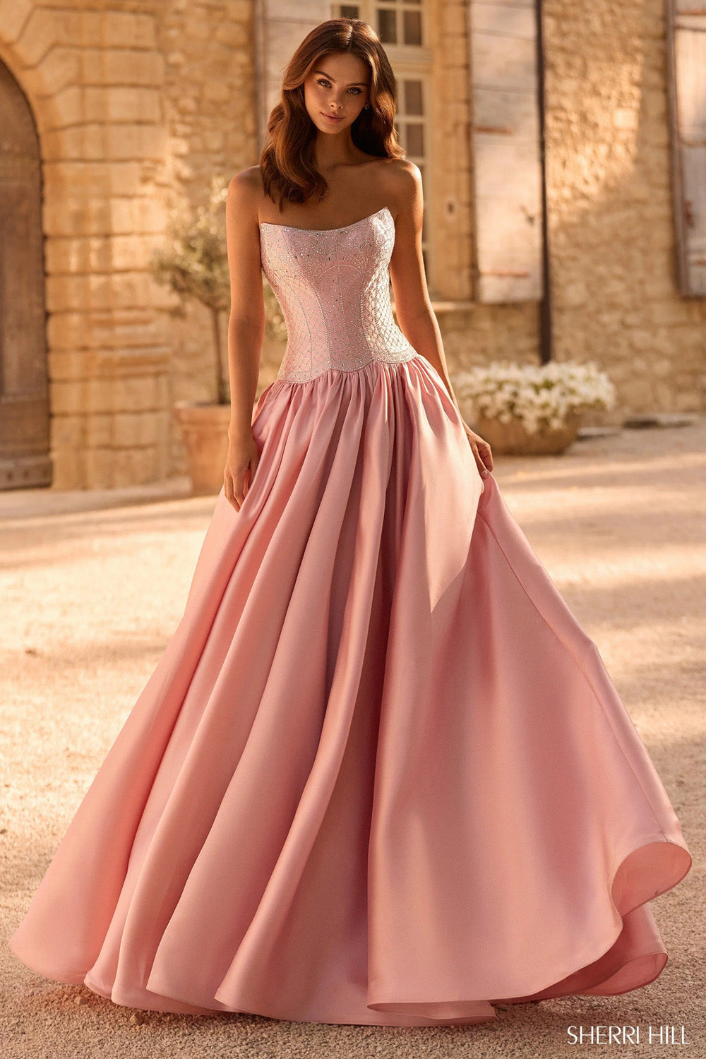 Sherri Hill 58522 blush silver full length front view with sweetheart corset and satin skirt in motion