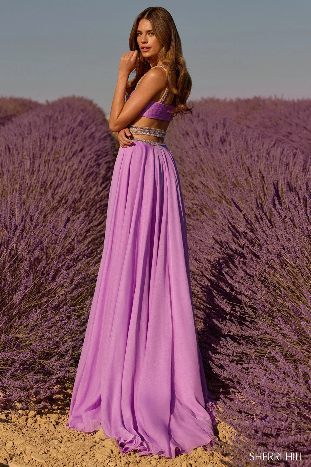Sherri Hill 58552 lilac A-line chiffon gown back view showing beaded midriff bands and full flowing skirt
