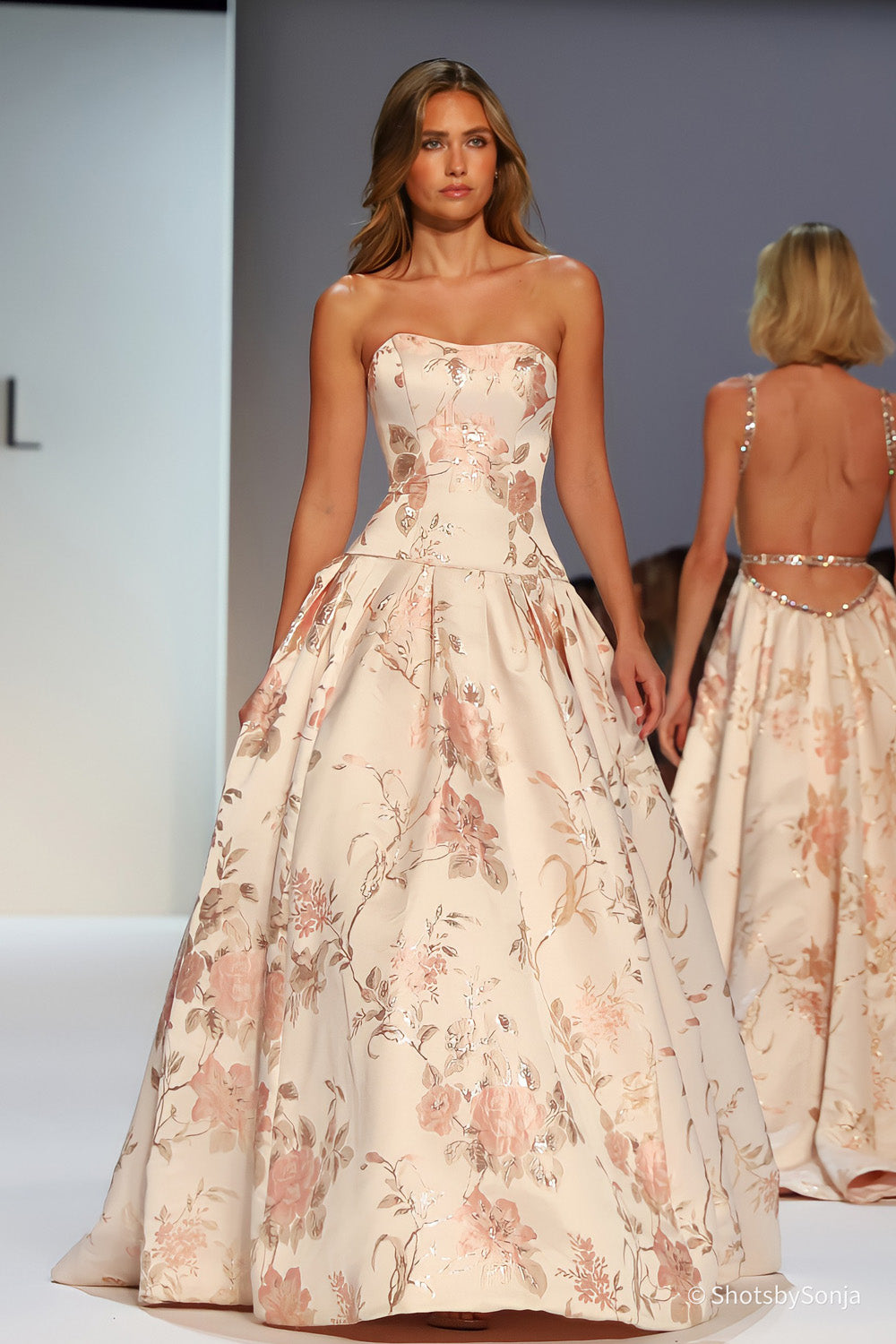 Sherri Hill 58594 blush print floral brocade strapless ballgown with full pleated skirt and structured bodice front view