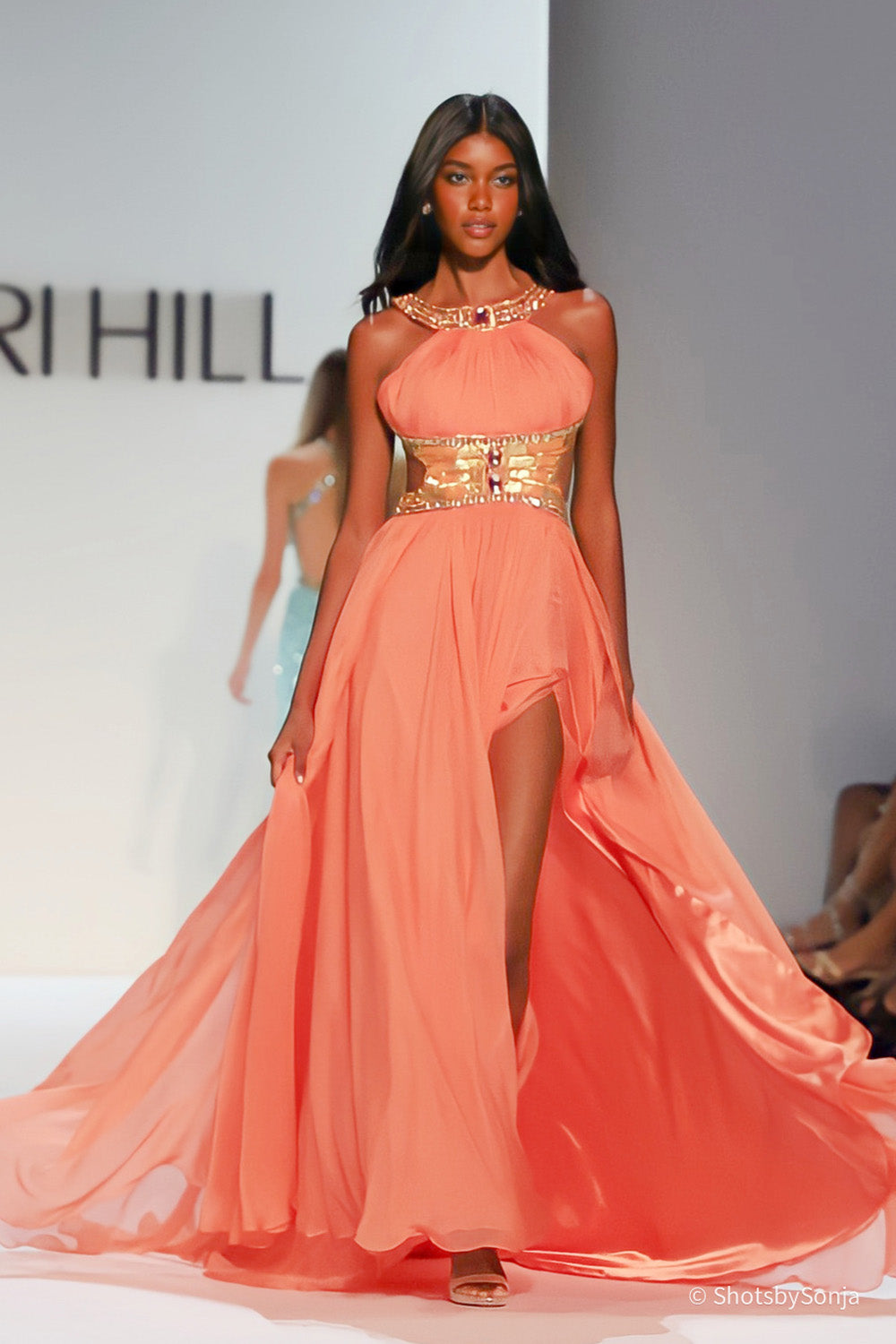 Sherri Hill 58740 coral gold halter gown with beaded corset waist and flowing chiffon skirt with front slit