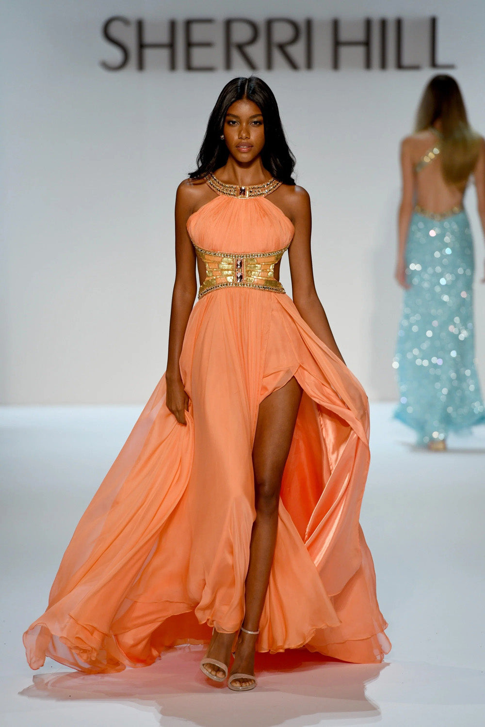 Sherri Hill 58740 coral gold chiffon halter gown with beaded corset waist and high front slit in full length view