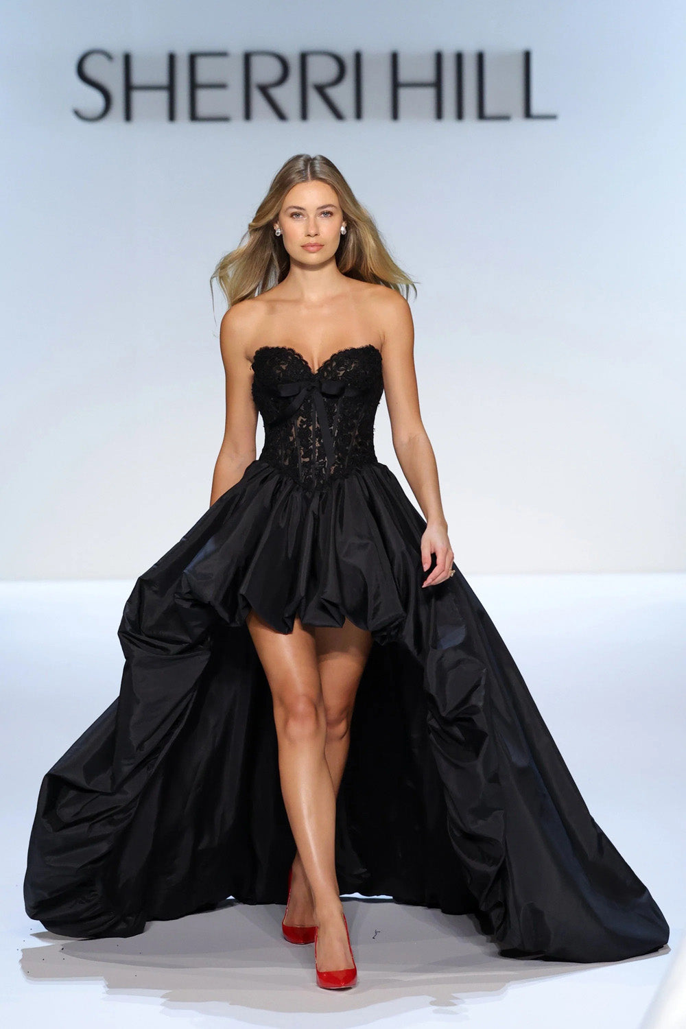 Sherri Hill 58779 black strapless lace corset gown with gathered taffeta skirt and sweeping floor length train