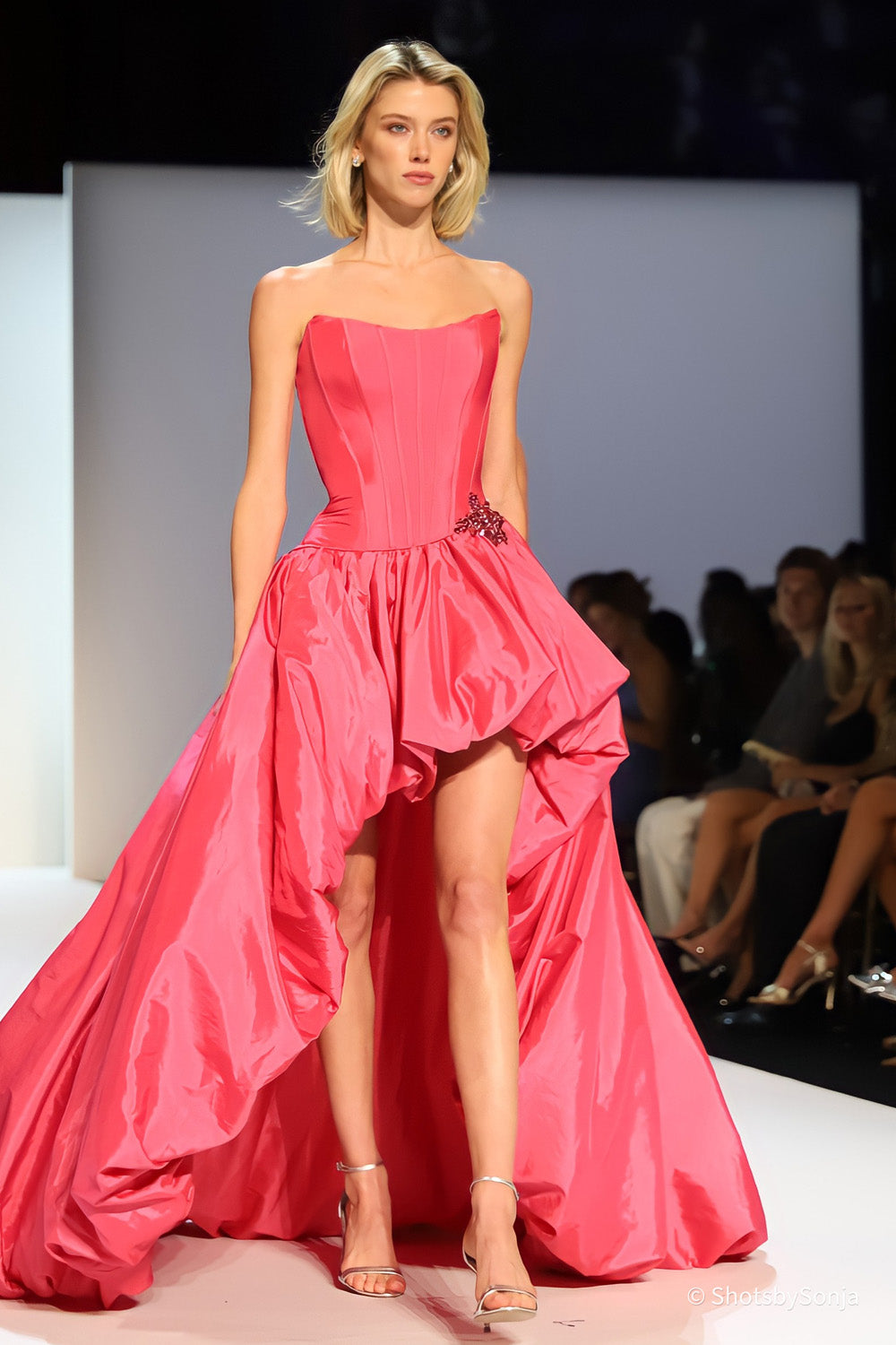 Sherri Hill 58848 bright pink taffeta strapless corset gown with gathered high low skirt and beaded hip detail
