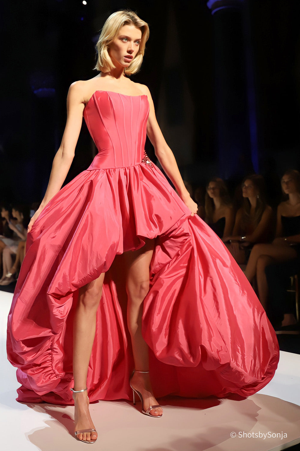 Sherri Hill 58848 bright pink strapless ballgown with voluminous gathered taffeta skirt in motion on runway