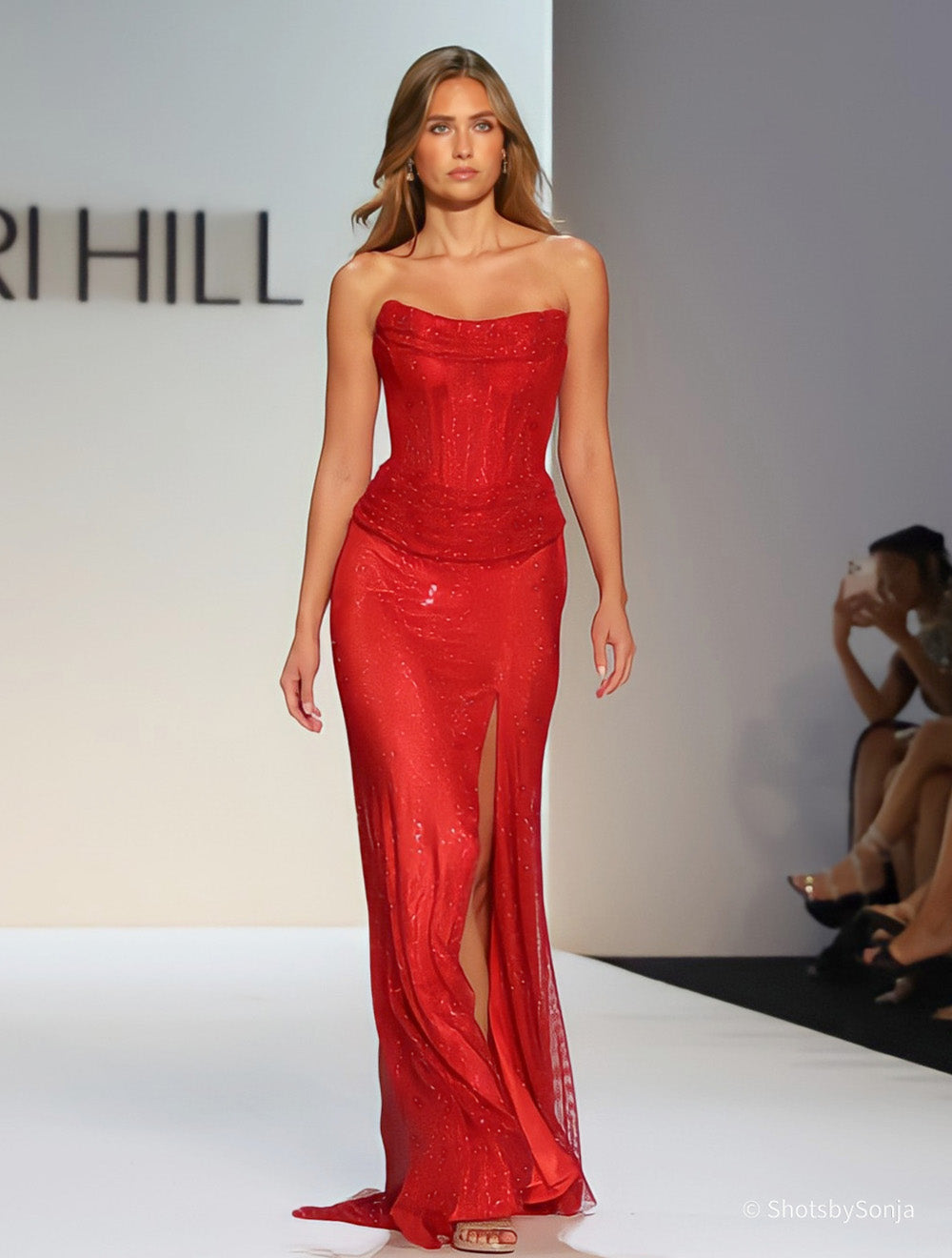 Sherri Hill 58899 red strapless corset gown with beaded bodice ruched waist band and front slit skirt