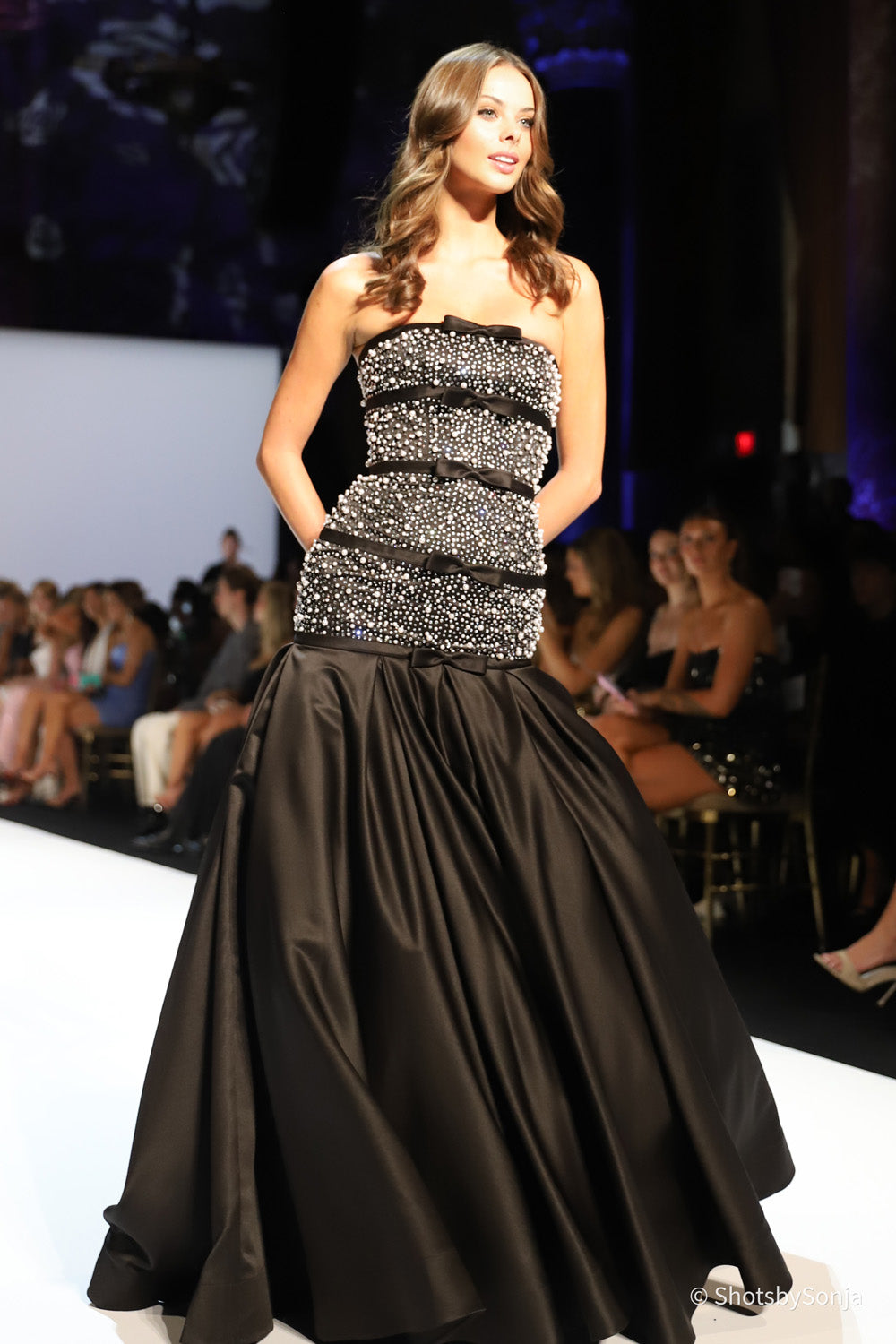 Sherri Hill 58929 black silver ball gown with beaded bodice satin bow details and full satin skirt front view
