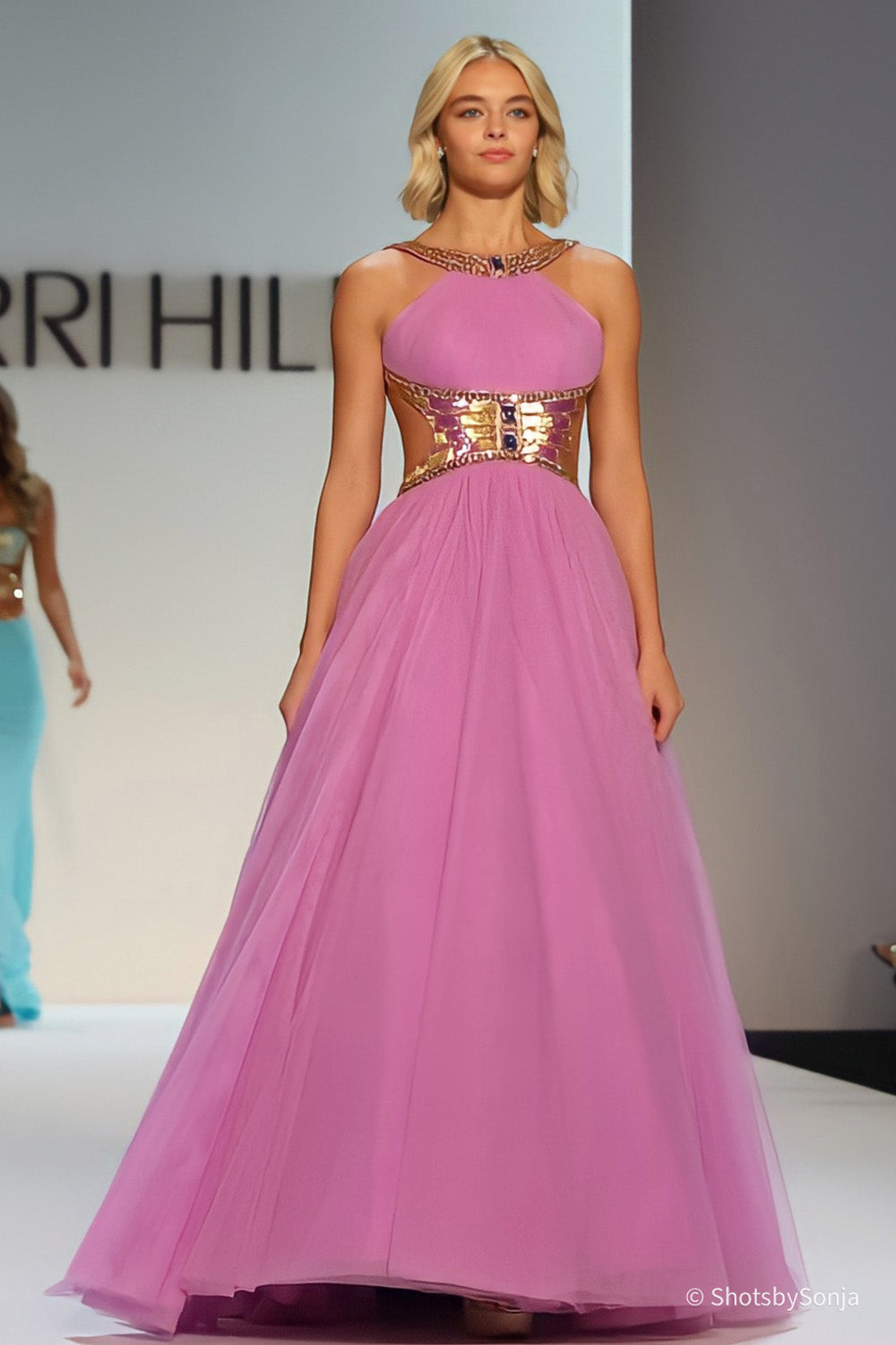 Sherri Hill 58935 orchid halter ballgown with beaded waistband and full tulle skirt seen from the front