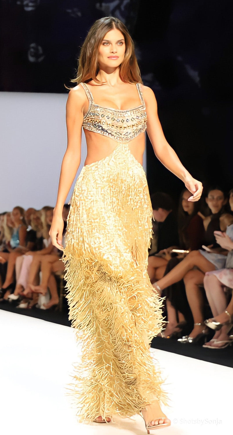 Sherri Hill 67307 gold fringe gown with beaded scoop neck bustier and side cutouts full length runway view