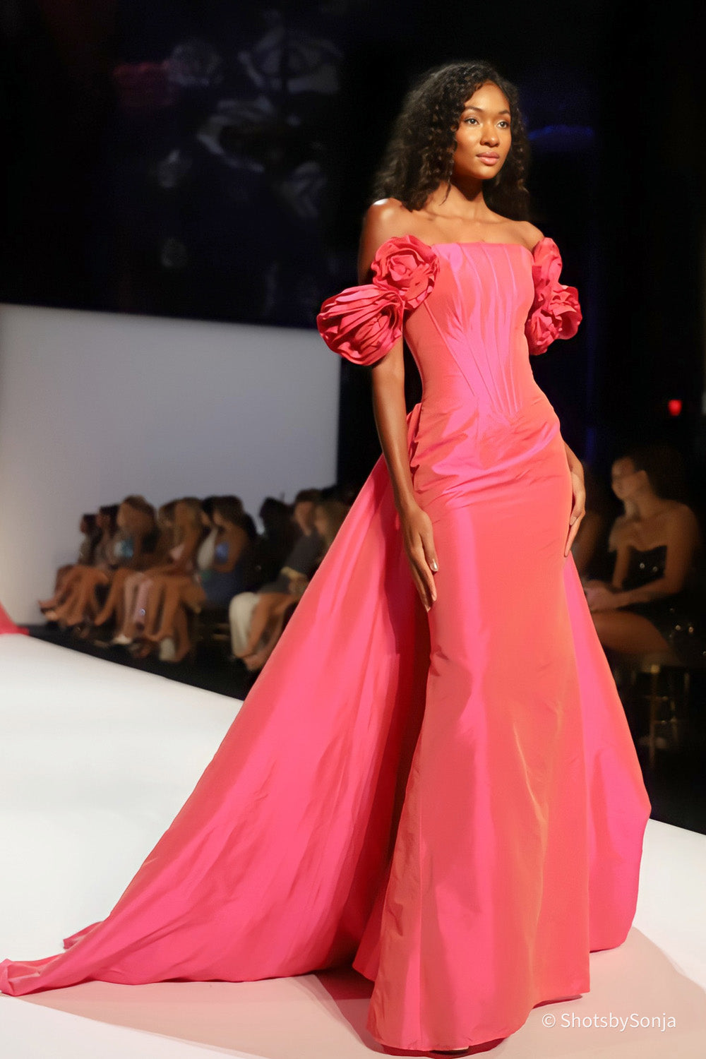 Sherri Hill 67309 coral taffeta off shoulder gown with rose puff sleeves and full A-line train side view