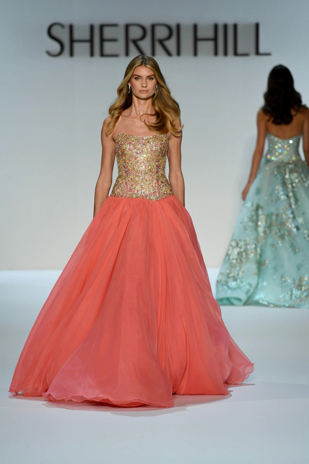 Sherri Hill 67344 coral and gold beaded strapless ballgown full silhouette front view on runway
