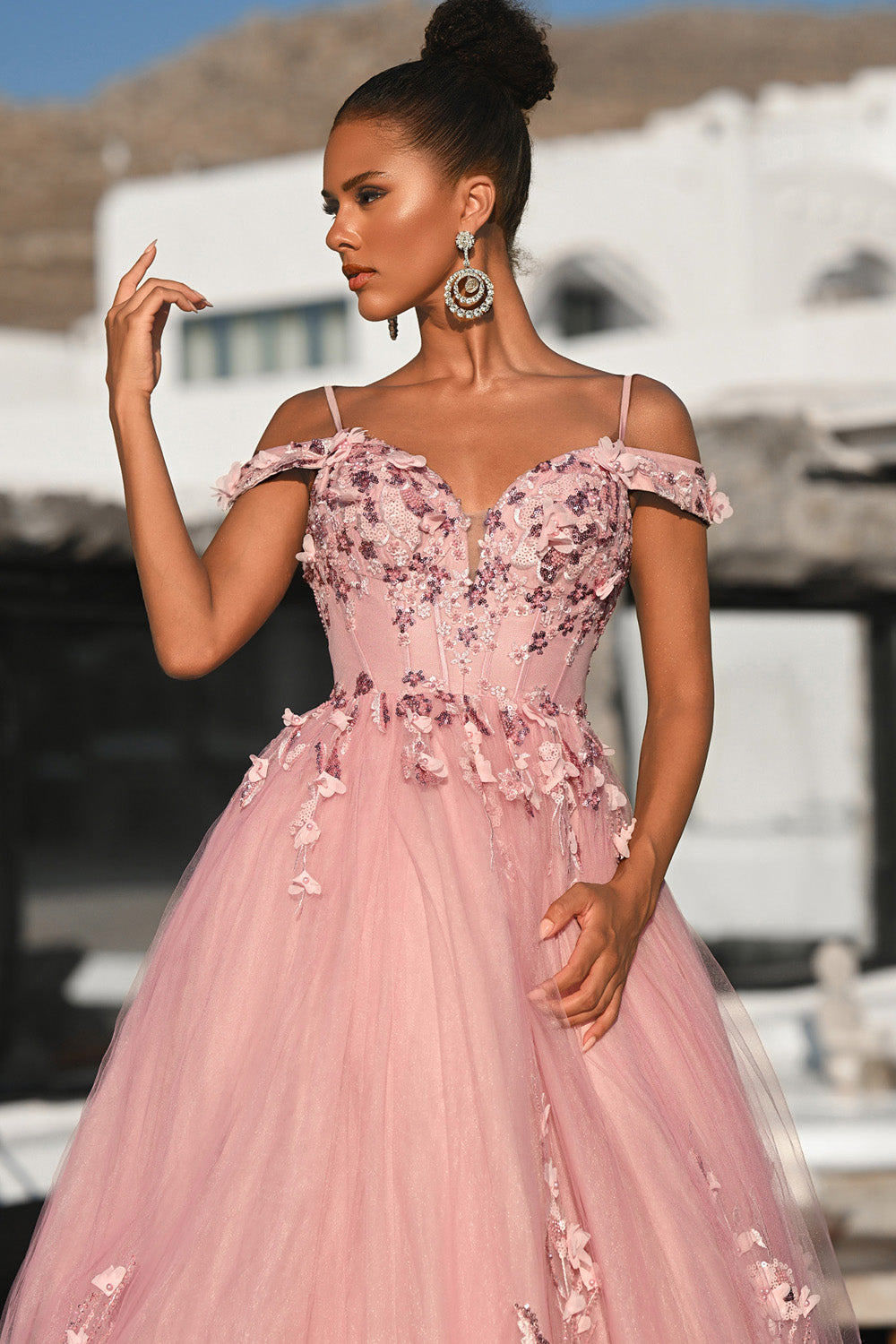 Portia and Scarlett PS26055 Pink prom dress with floral embellishments and a fitted bodice, front view.