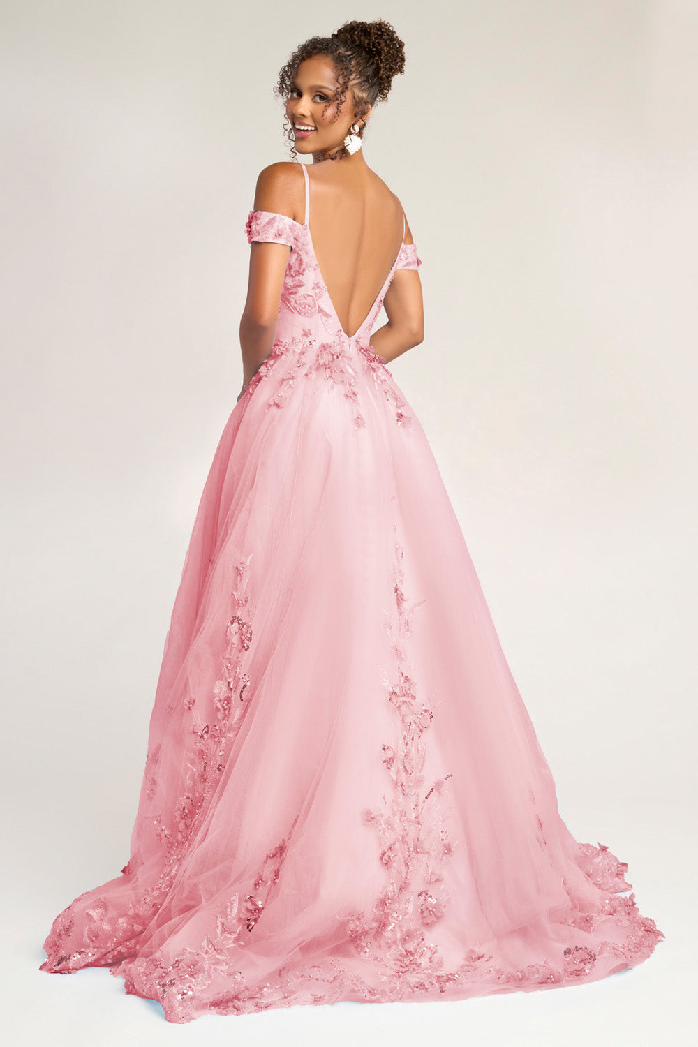 Portia and Scarlett PS26055 Pink ballgown prom dress with floral embellishments and a low back design.