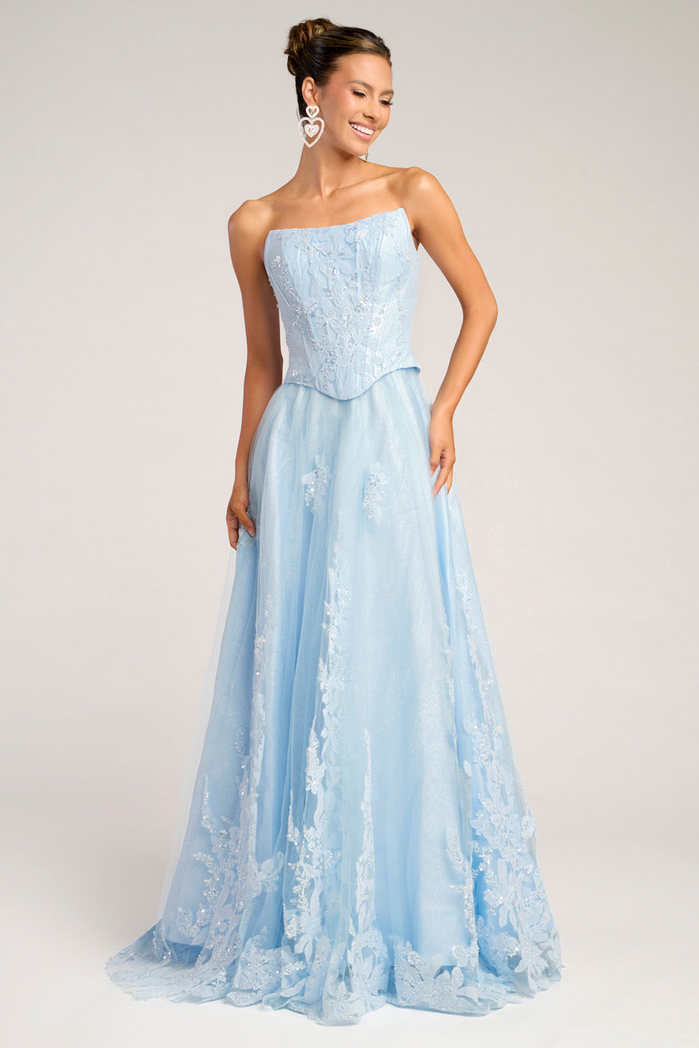 Portia and Scarlett PS26061 Light blue prom dress with a fitted bodice and intricate lace detailing.