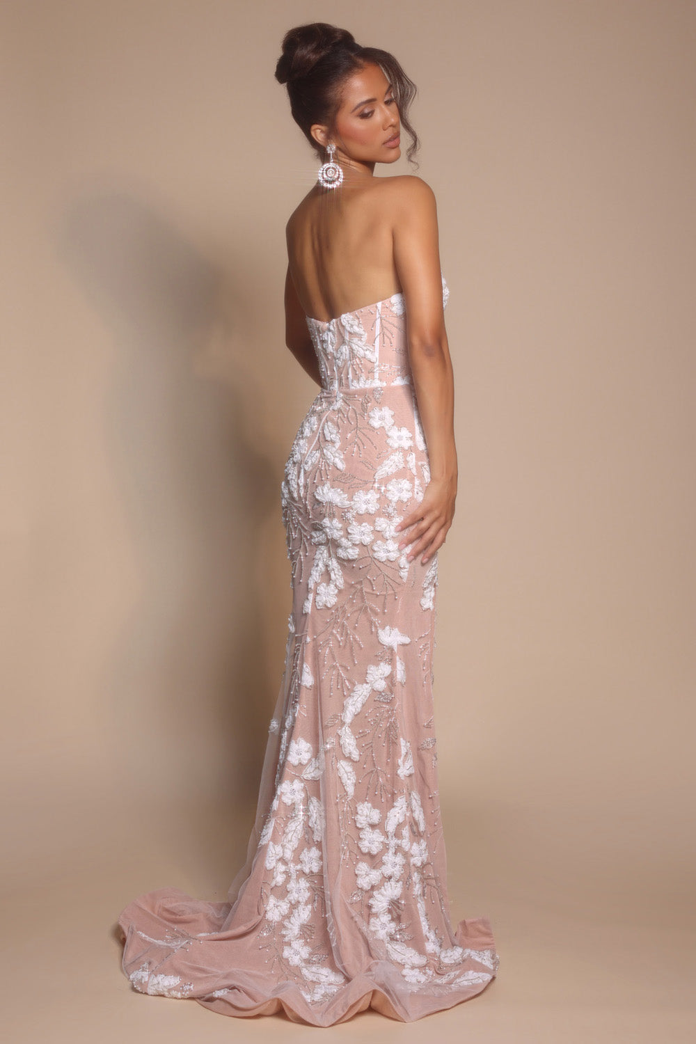 Portia and Scarlett PS26074 Ivory nude mermaid prom dress with intricate floral beading, back view.