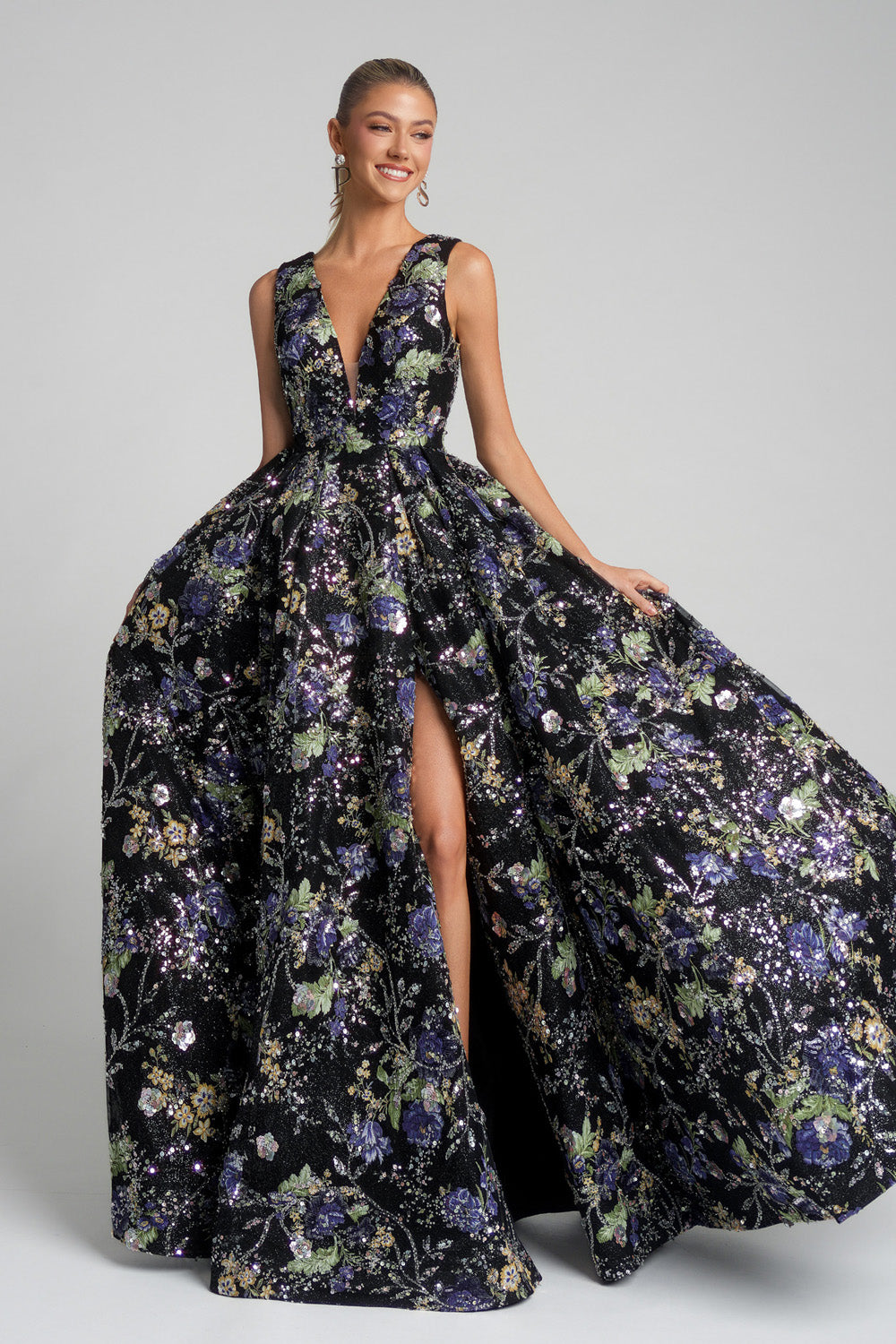 Portia and Scarlett PS26091 Black floral prom dress with a deep V-neck and high slit, featuring a ballgown silhouette.