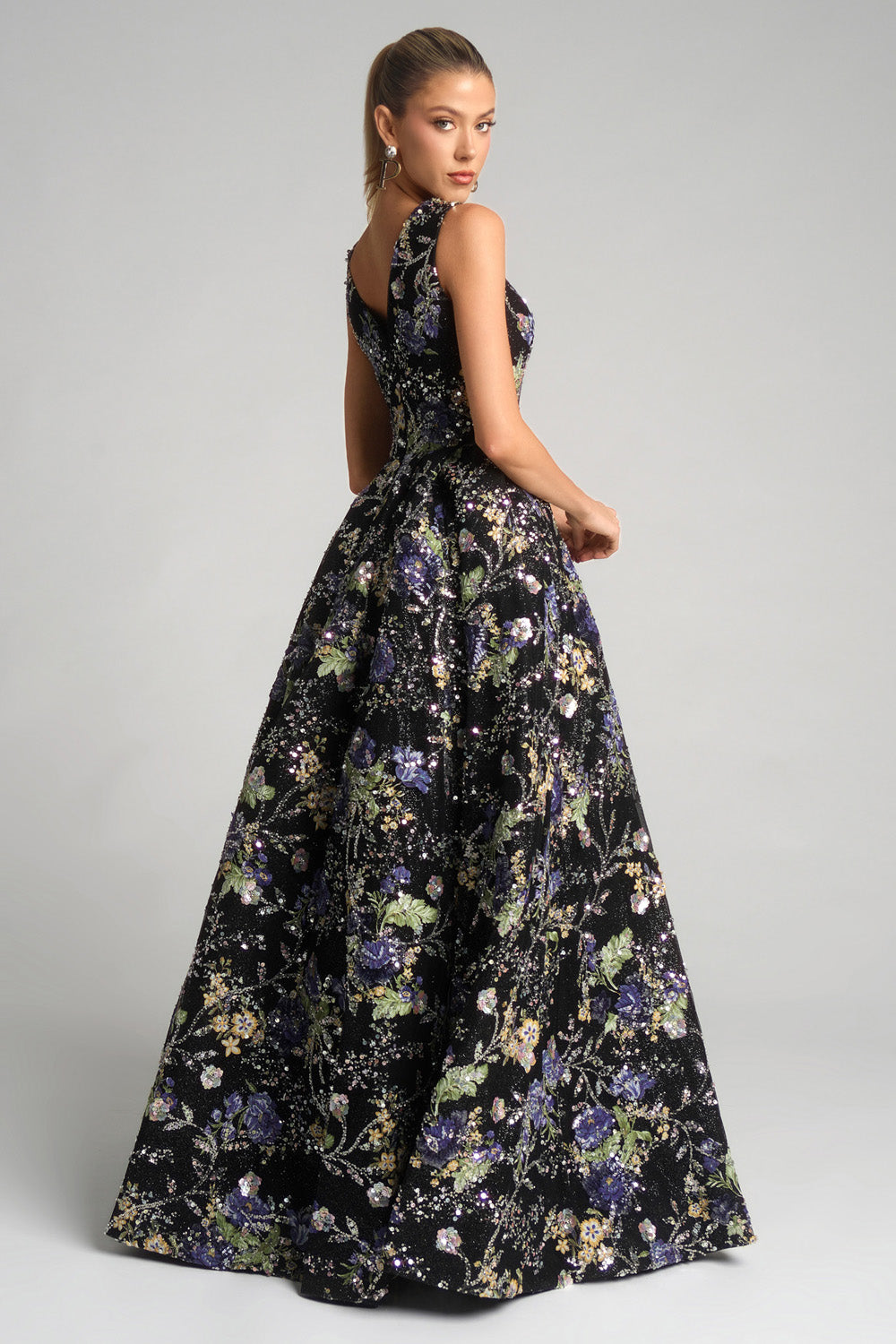 Portia and Scarlett PS26091 Black floral ballgown with sequins and a fitted bodice, back view prom dress.