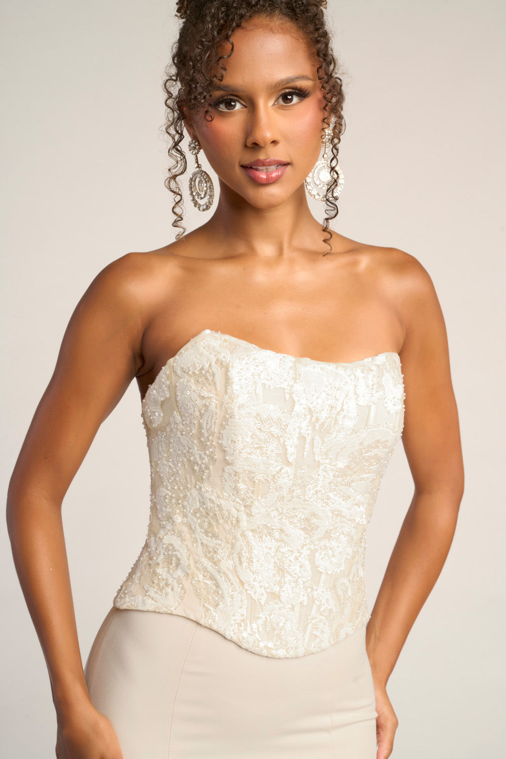 Portia and Scarlett PS26092 Cream mermaid prom dress with intricate beading, featuring a strapless design.