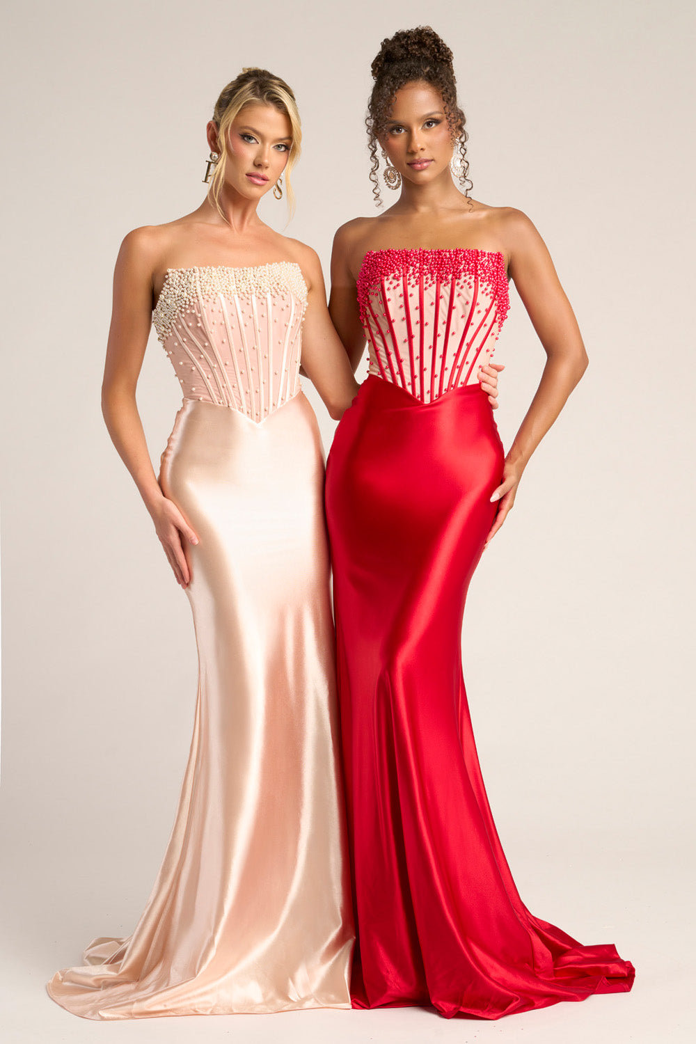 Portia and Scarlett PS26094 Red mermaid prom dress with beaded corset and strapless design.
