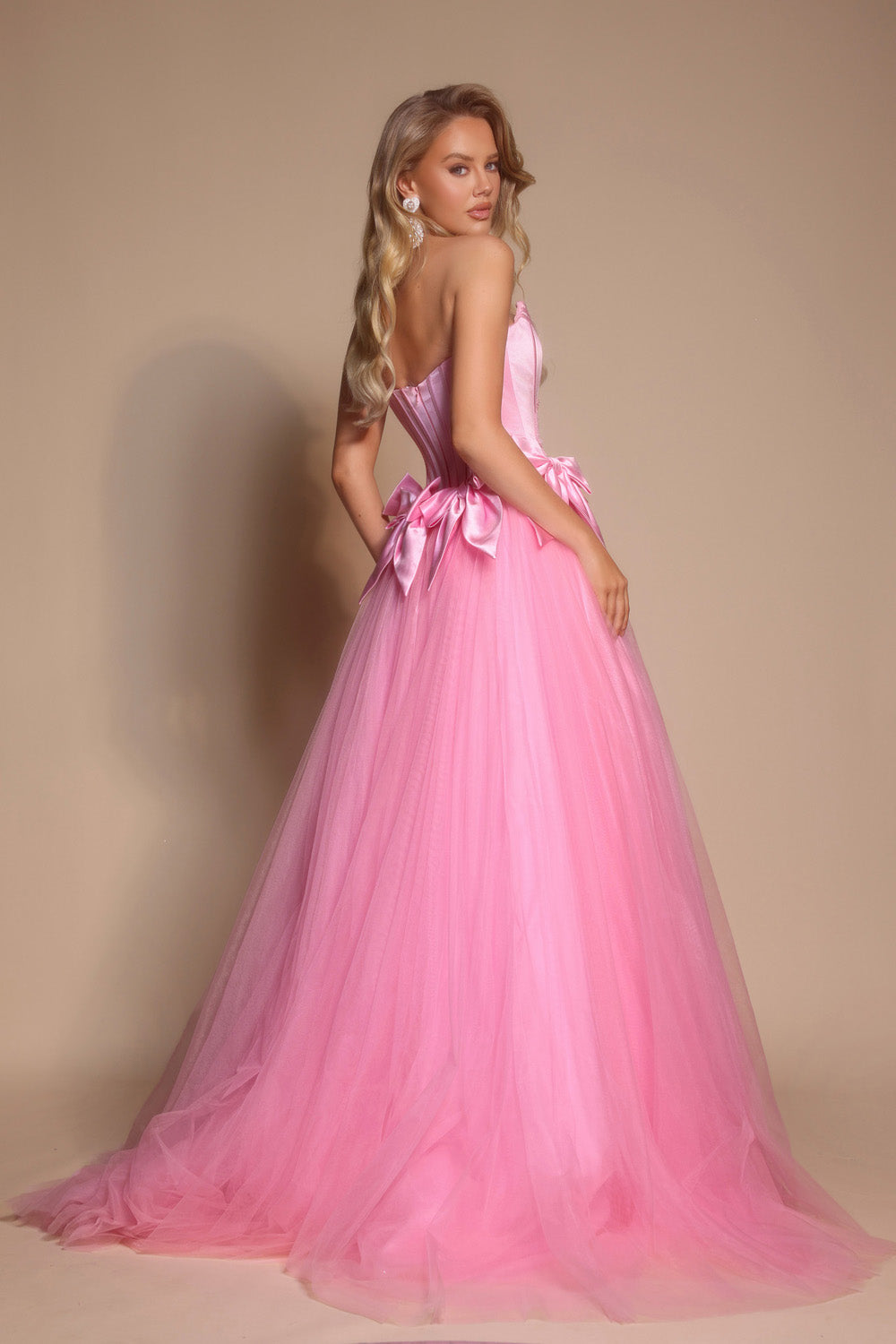 Portia and Scarlett PS26102 Light pink ballgown prom dress with a corset back and flowing tulle skirt.