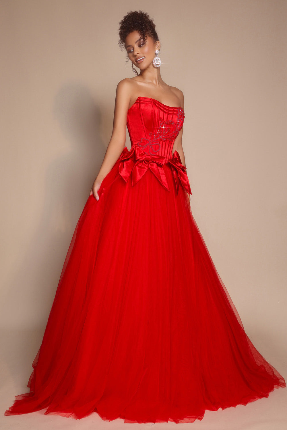 Portia and Scarlett PS26102 Red ballgown prom dress with corset bodice and bow detail.