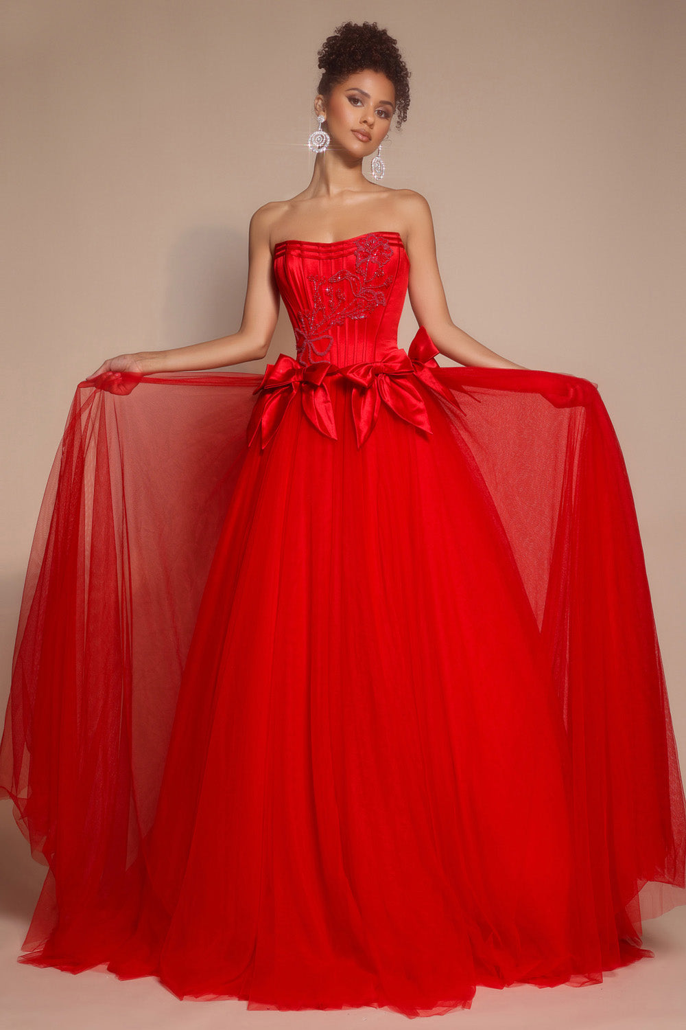 Portia and Scarlett PS26102 Red ballgown prom dress with beaded bodice and flowing tulle skirt.