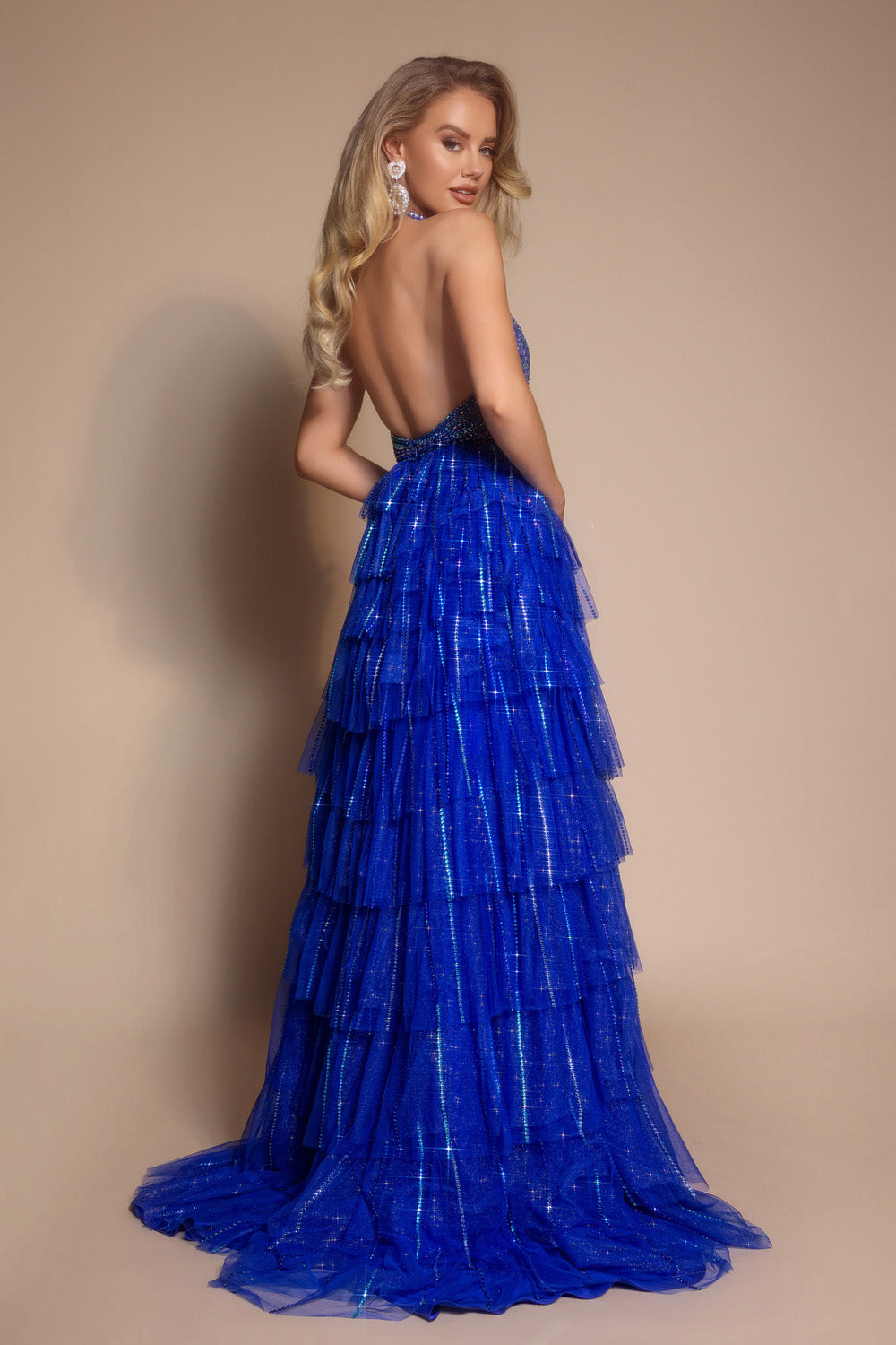 Portia and Scarlett PS26117 Royal blue formal gown with layered ruffles and a stunning open back.