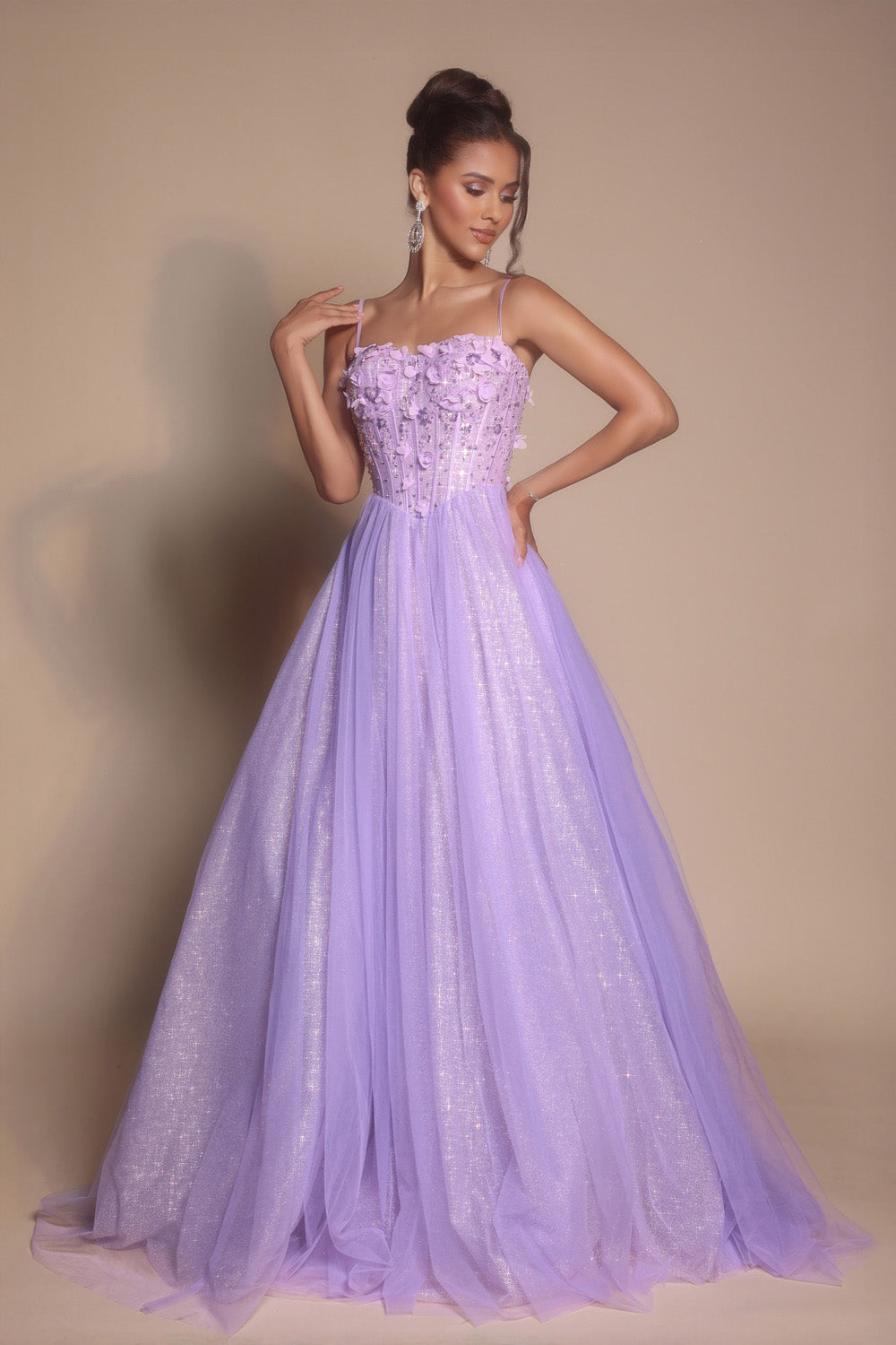 Portia and Scarlett PS26146 Lilac prom dress with a fitted bodice, floral detailing, and flowing skirt.