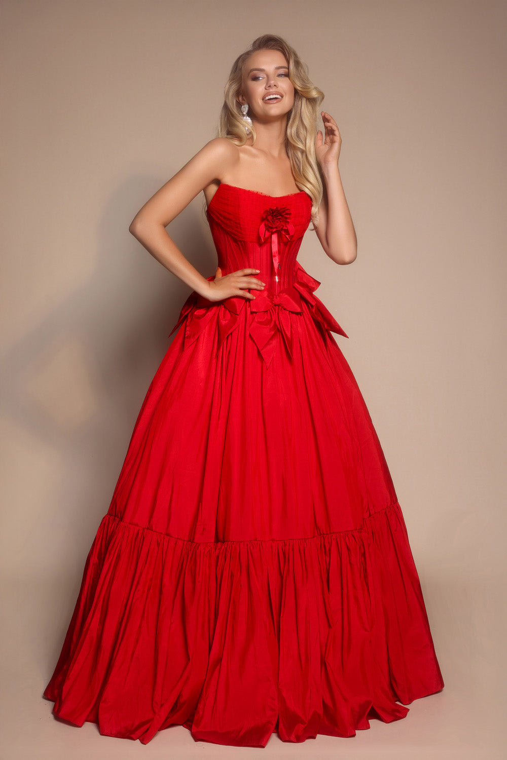 Portia and Scarlett PS26148 Red ballgown prom dress with a corset bodice and layered ruffle skirt.