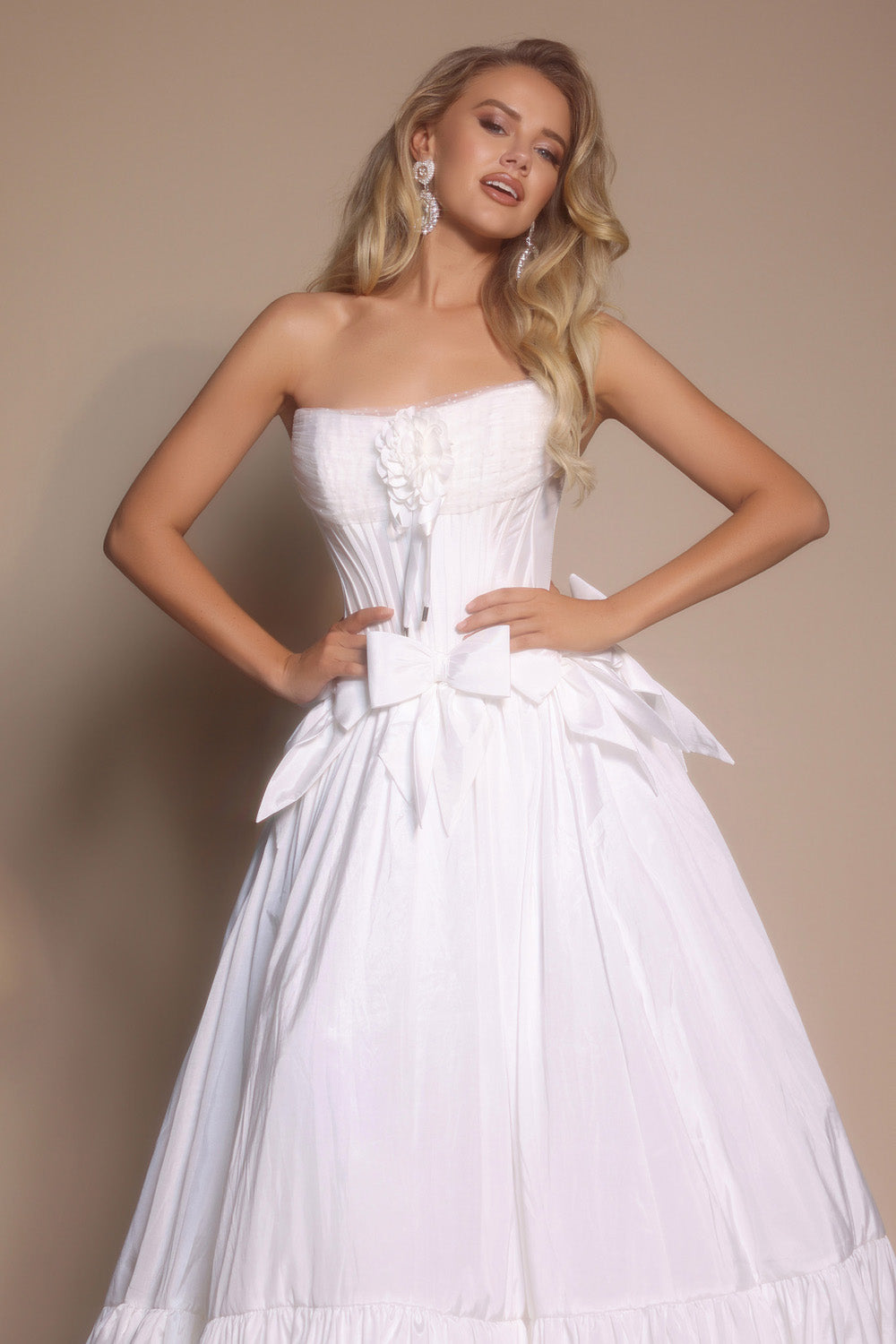 Portia and Scarlett PS26148 Strapless white ballgown with floral detail and bow, perfect for prom prom dress.