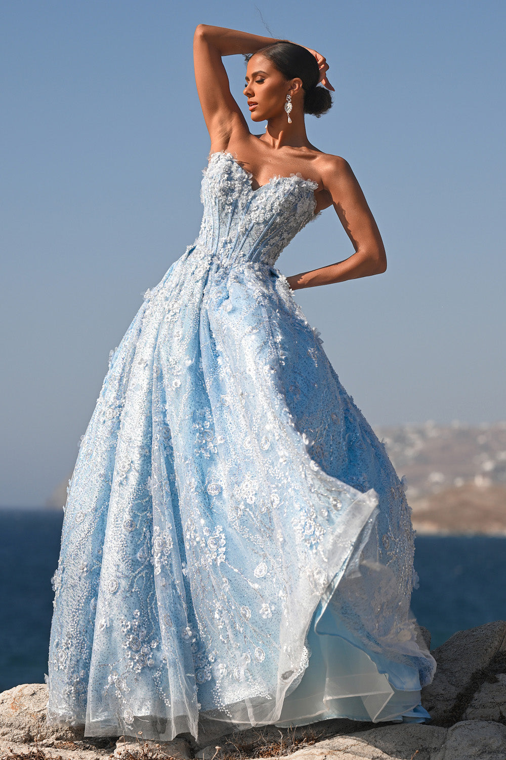 Portia and Scarlett PS26149 Blue ballgown prom dress with intricate beading and a corset back, front view.