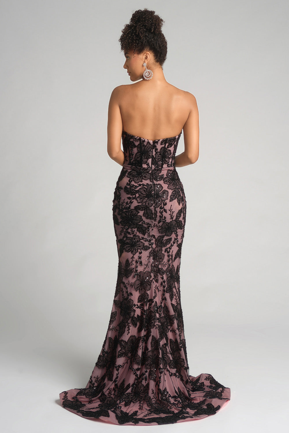 Portia and Scarlett PS26175 Black and pink mermaid prom dress with intricate floral lace and a corset back.